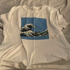 White shirt with animated ocean wave on the front